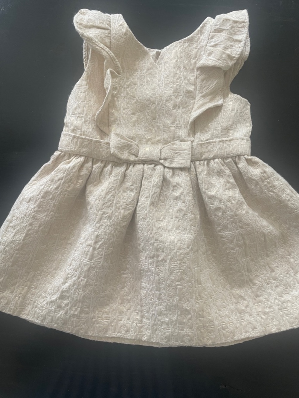 OshKosh B'gosh Cream Textured with gold Shimmer  Bow Waist Ruffle Dress